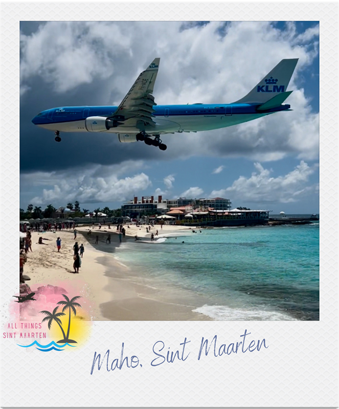 Photo of a landing plane at Maho Airport Beach Sint Maarten on All Things Sint Maarten